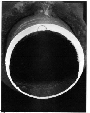 Прохудившаяся стенка трубы теплообменника