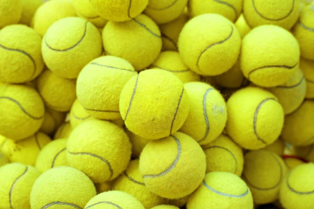 Пробивание застрявшего зерна теннисными мячиками