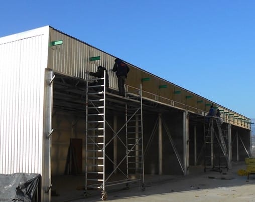 Процесс утепления камерной сушилки для досок и поддонов